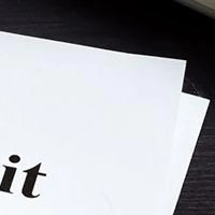 pen placed on top of paper with certificate of deposit printed on it
