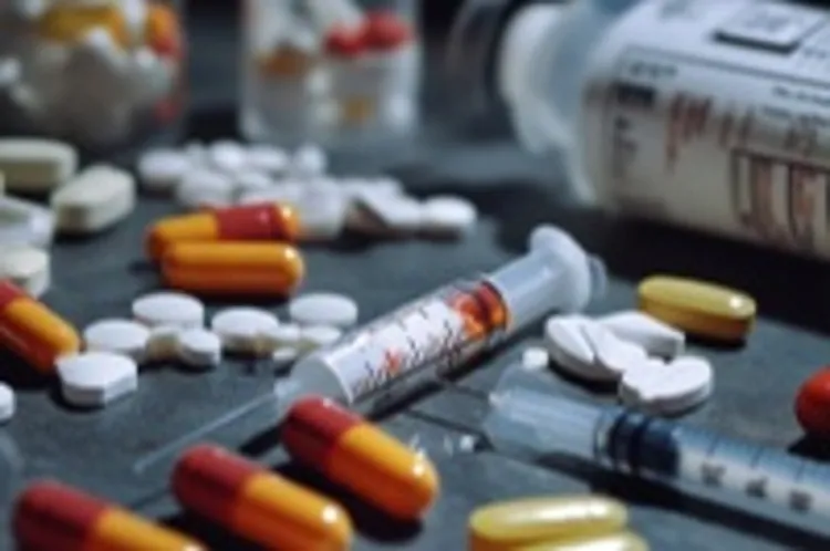 random pills and syringes