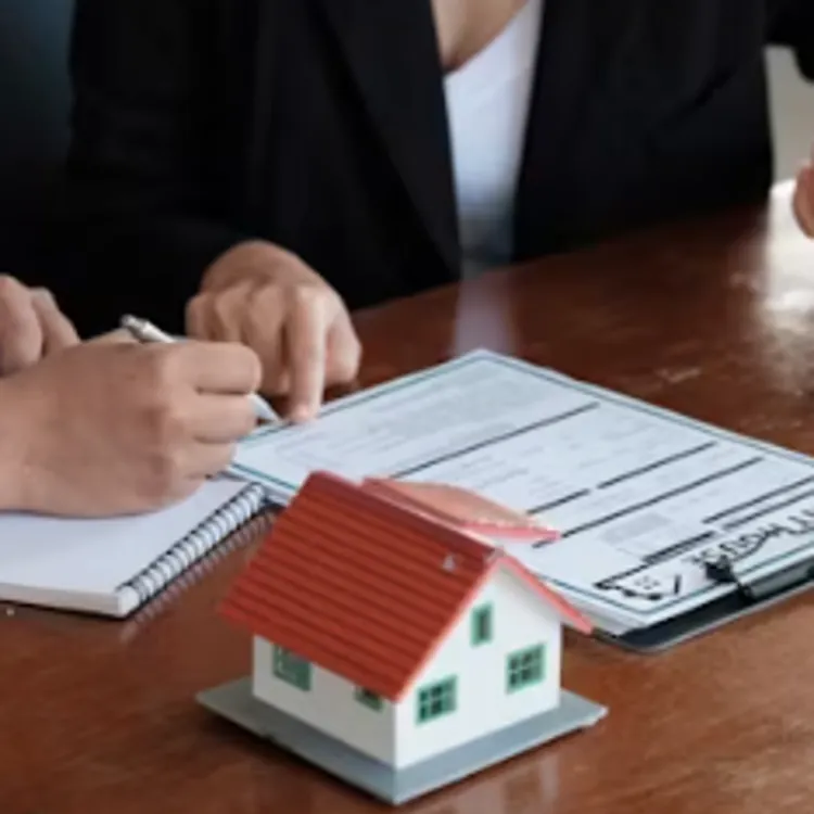 Reviewing mortgage documents during a home loan consultation