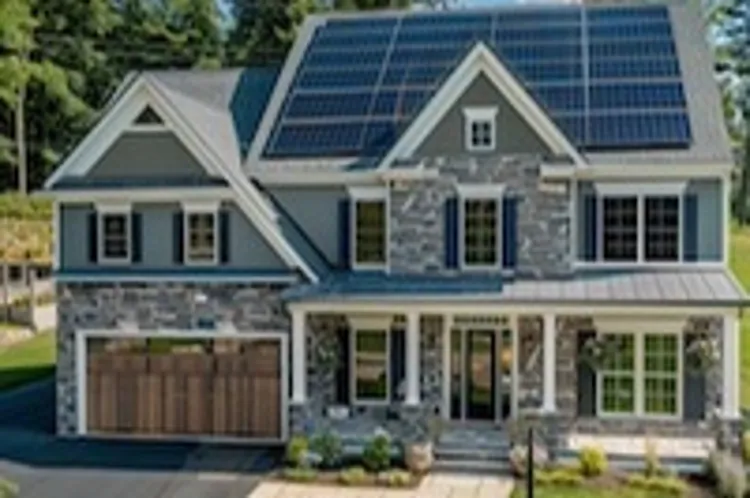 a brick house with solar panels on the roof