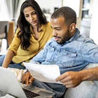 young couple planning their finances together
