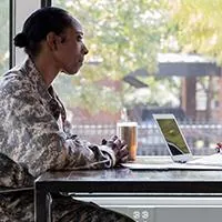 banker talking with military officer