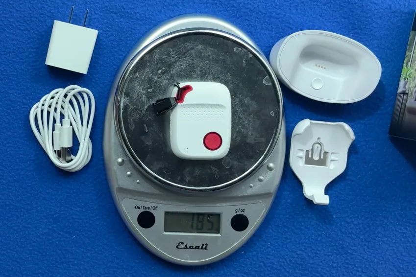 SOS All-in-One 2 pendant on a kitchen scale reading 1.85 ounces