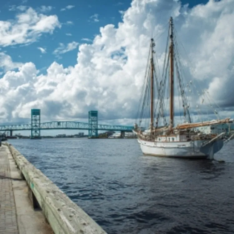 a view with a boat and a bridge