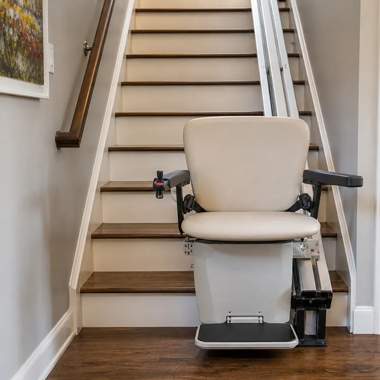 Motorized stair lift chair installed on a wooden staircase in a residential home