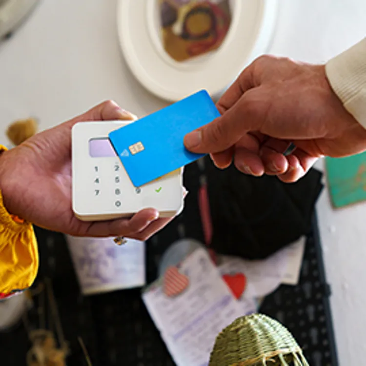 man paying with a credit card