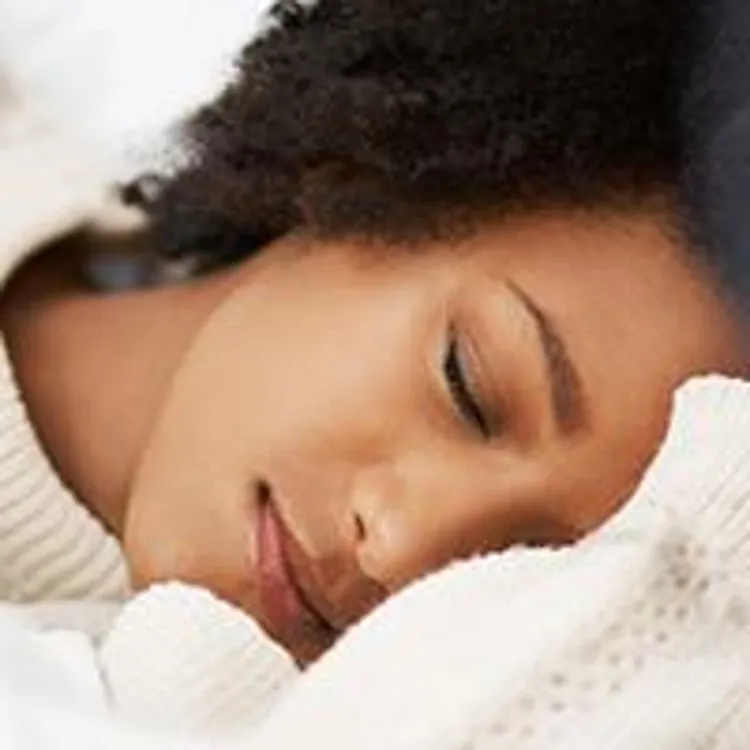 woman sleeping on side