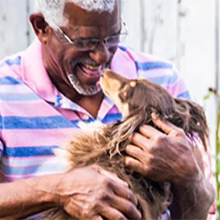 elderly man with dog