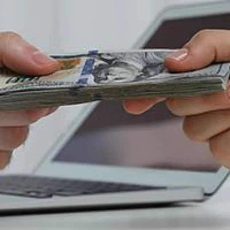 lender handing over money to borrower