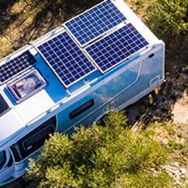 parked rv with solar panels on roof