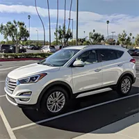 image showing a white Buick Enclave vehicle