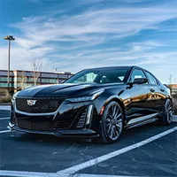 a cadillac in a parking lot