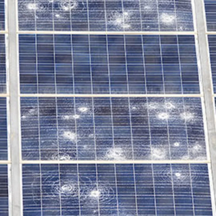 solar panels damaged by the impact of stones of hail