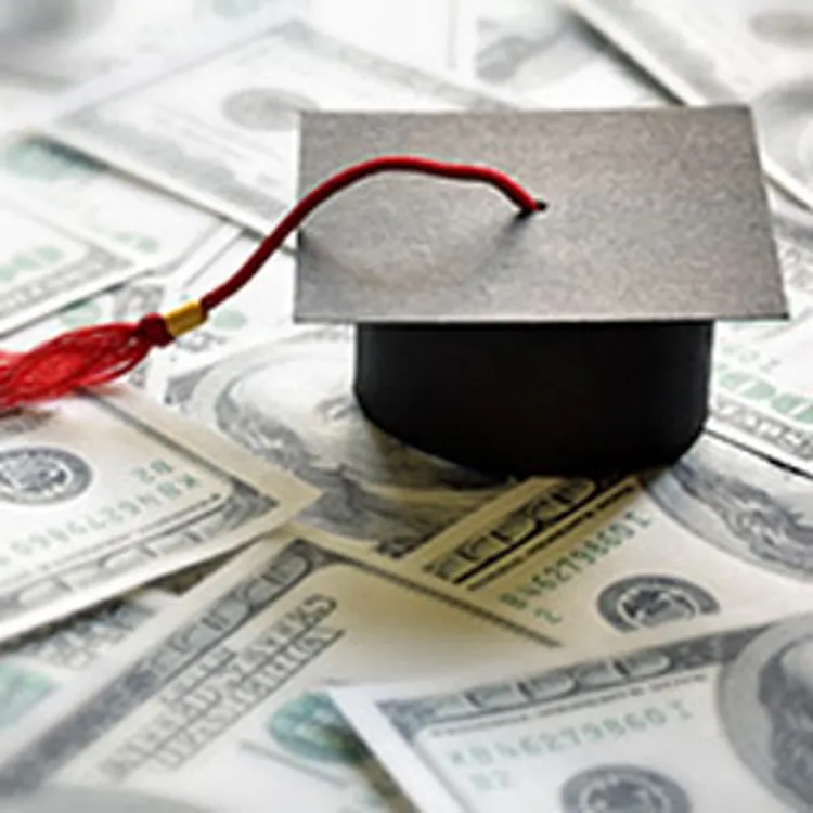 Graduation Cap on a Pile of Money