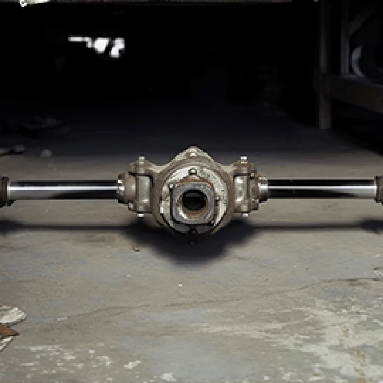 black and white image showing a car axle