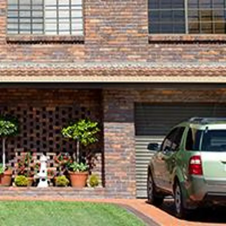 car parked in house driveway