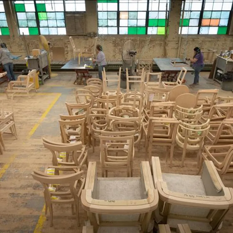 stack of chairs in furniture factory