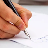 person signing official documents