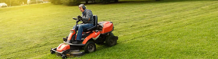 man mowing lawn
