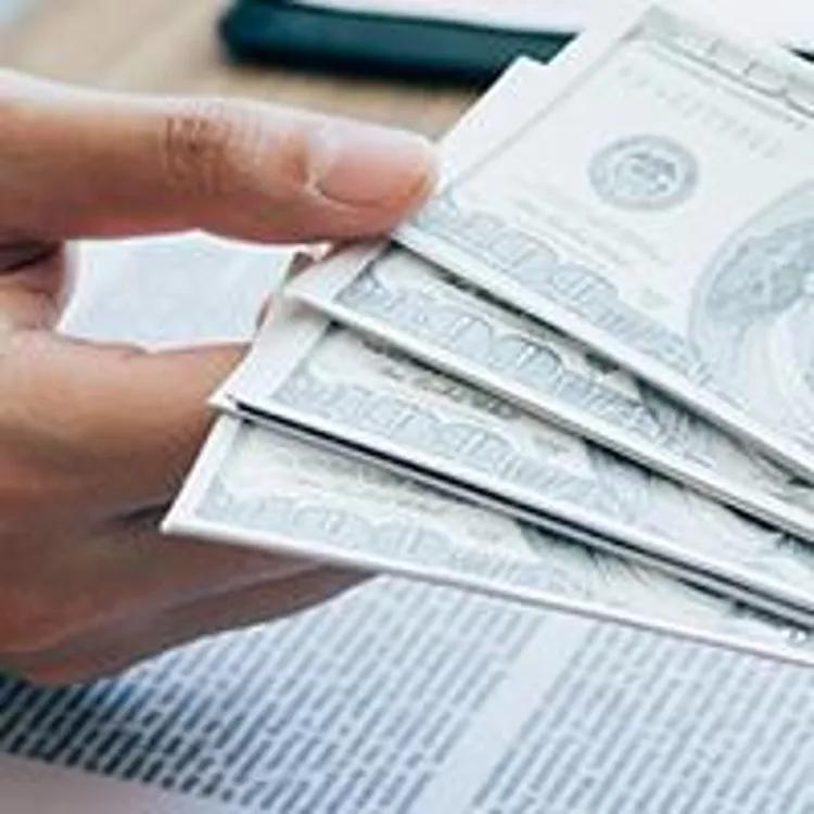 contract under cash being passed