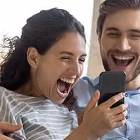 couple excited approved for online loan