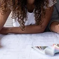 couple looking at house blueprints