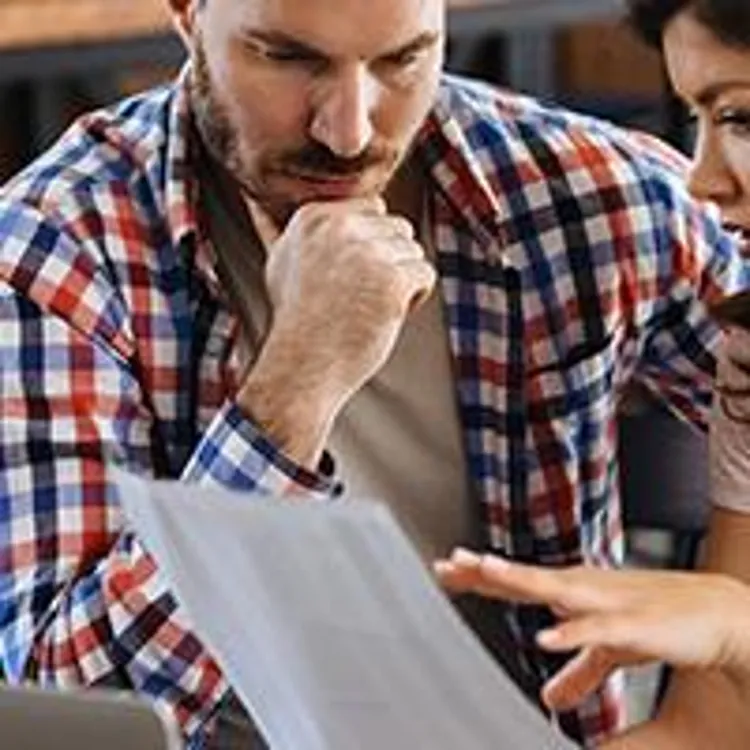 couple looking at paperwork