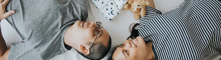 couple with baby blanket
