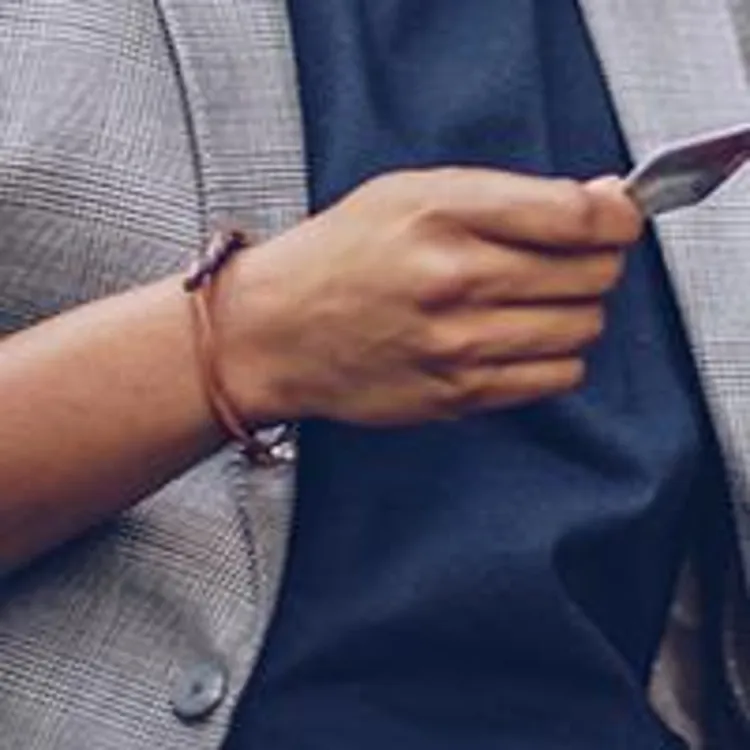 business man holding credit card