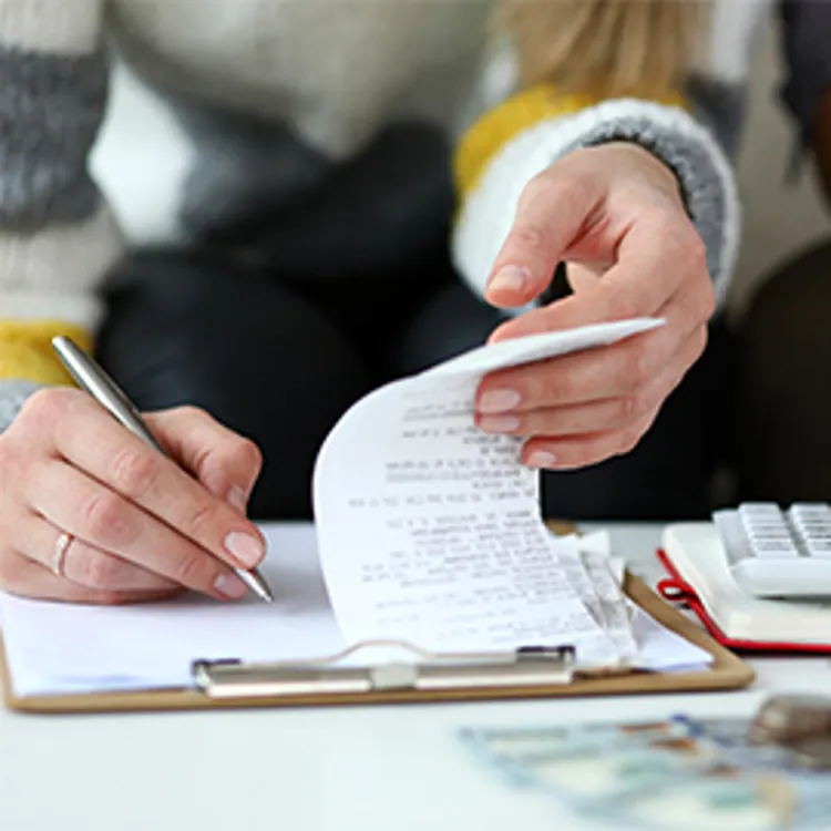 husband and wife calculating bills