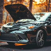 car with an open hood