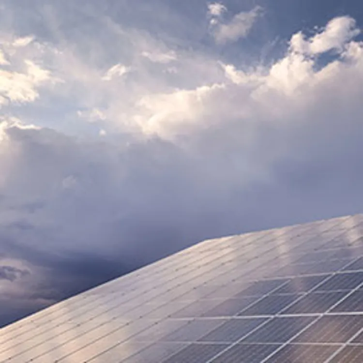 solar panel against cloudy sky