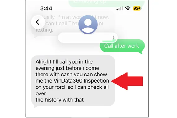 Smartphone screen showing a text message about a VinData360 inspection for a Ford vehicle