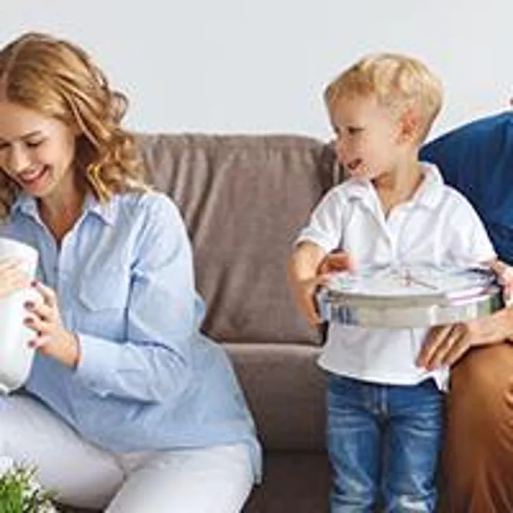 young family moving into a new house