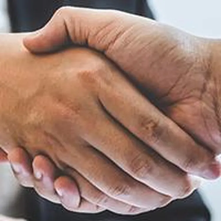 two men shaking hands