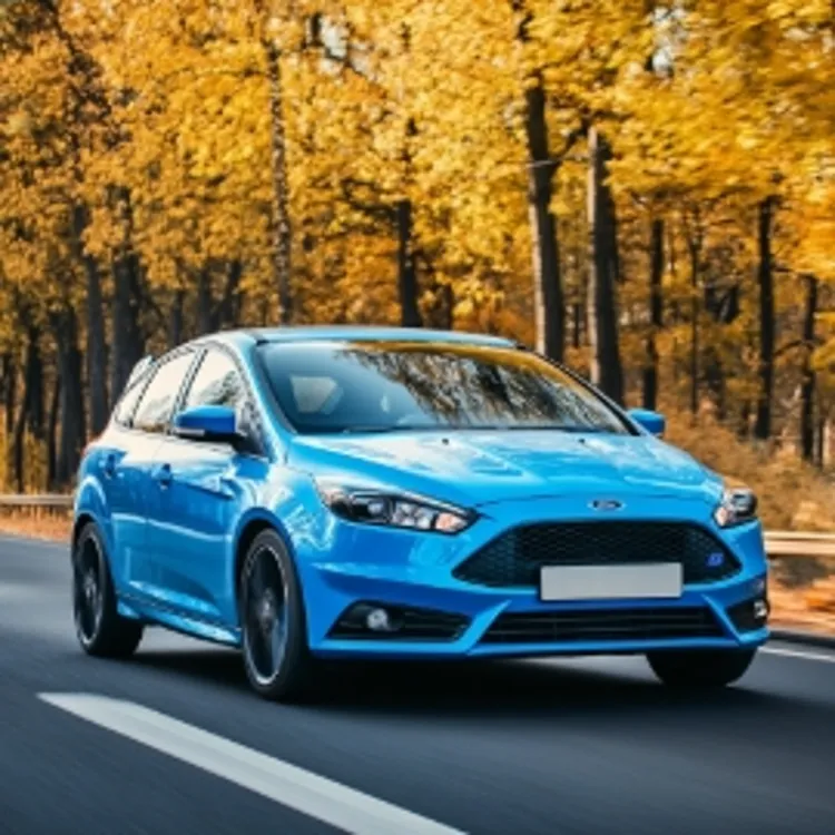 a blue Ford Focus on a highway