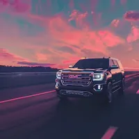 a GMC SUV on a highway