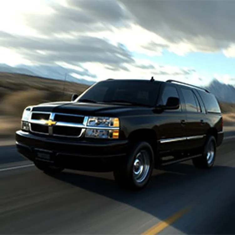 black chevrolet tahoe along a mountain road