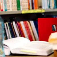 college girl studying in a library