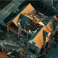 Top view of a house without roof damaged by tornado