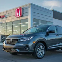 honda car parked outside dealership building