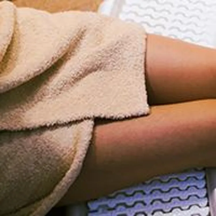 woman relaxing in hot tub