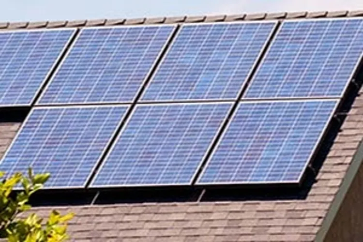 roof of suburban home with solar panels