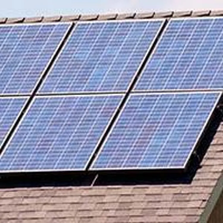 roof of suburban home with solar panels