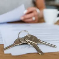 keys and documents on a table