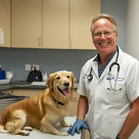 Smiling male vet in a clinic with a large happy dog