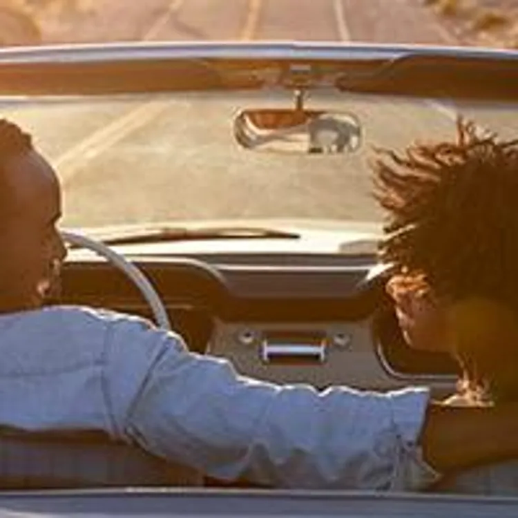 couple riding in car