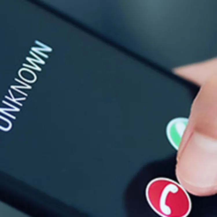 cellphone displaying an unknown caller