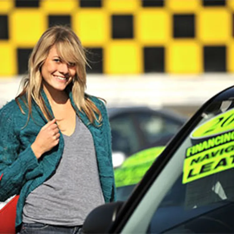 woman shopping for used car