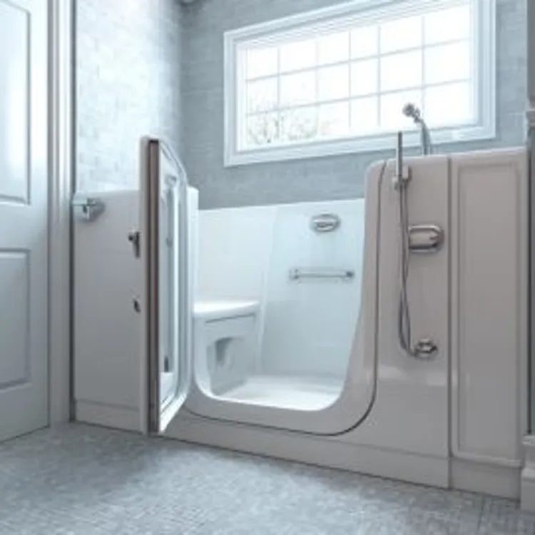 a walk-in tub inside a gray tiled bathroom with a rectangular window